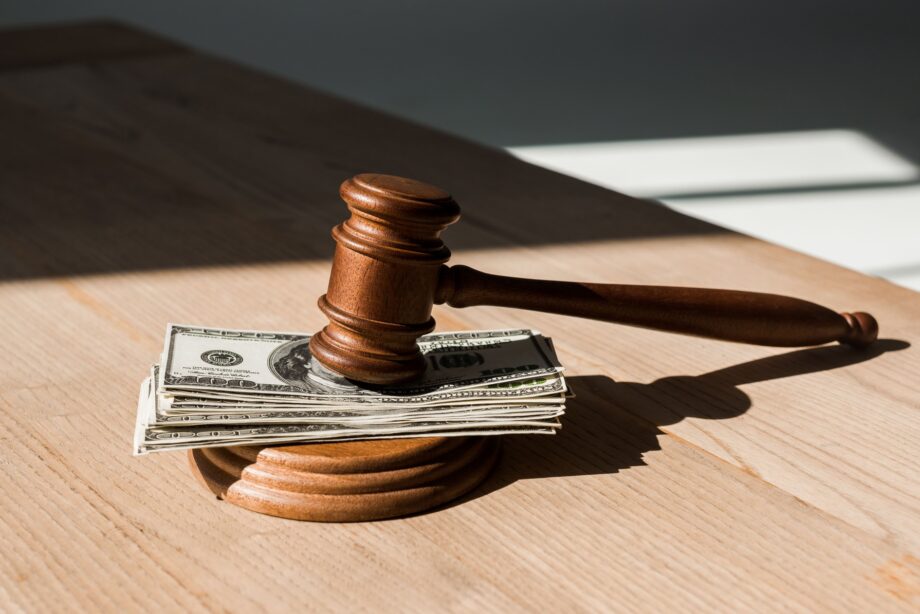Gavel next to cash, representing legal fees in a DWI case
