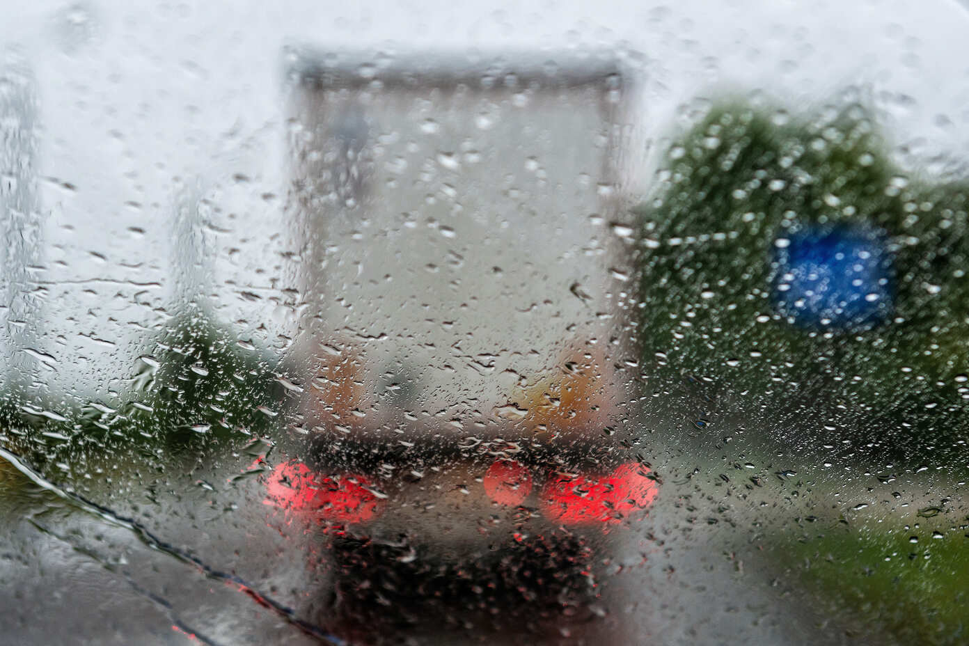 Semi-truck driving on a wet Texas highway, a common cause of jackknife accidents